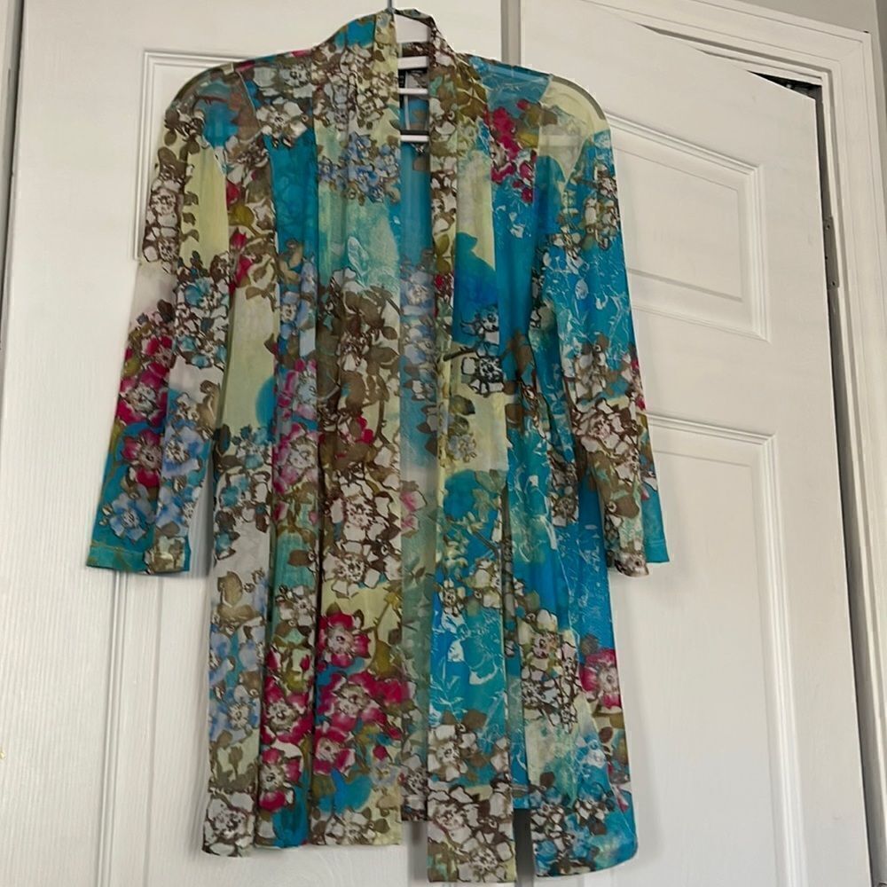 Pretty sheer floral jacket. Great to go over a sundress or use as a summer wrap.